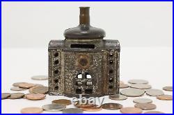 Farmhouse Antique Cast Iron Coin Bank with Bullet Chimney #48856