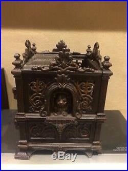 Gorgeous cast iron mechanical counting house bank. Late 1800s