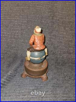 J & E Stevens Clown on Globe Cast Iron Mechanical Coin Bank Spinning Acrobat