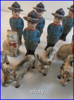 Lot of vintage cast iron penny banks soldier cow steer cat
