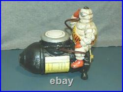 MICHELIN TIREMAN SITTING ON AIR COMPRESSOR GETTING INFLATED Cast Iron Bank PROMO