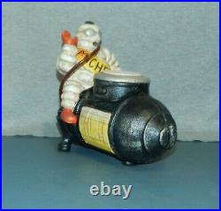 MICHELIN TIREMAN SITTING ON AIR COMPRESSOR GETTING INFLATED Cast Iron Bank PROMO