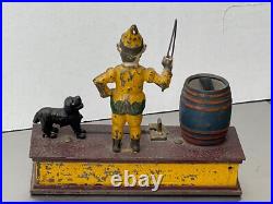 Mechanical Bank trick dog works. 1988. Original paint and lock