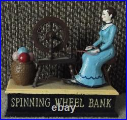 Mechanical Spinning Wheel Bank, cast iron, C. Hawthorne Direct LLC