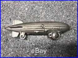 Mint Condition Circa 1934 Cast Iron Graf Zeppelin on Wheels Pull Toy Bank