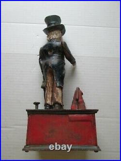 ONE (1) ORIGINAL CAST IRON 1920s UNCLE SAM WORKING MECHANICAL BANK, as seen
