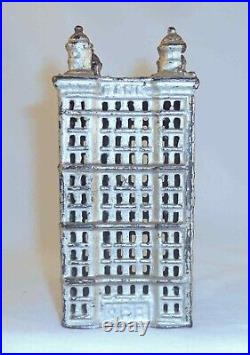 Old Silver Colored Cast Iron Still Penny Bank Skyscraper 5 1/2 by A. C. Williams