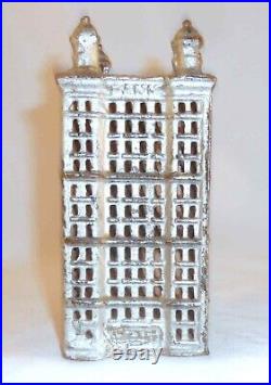 Old Silver Colored Cast Iron Still Penny Bank Skyscraper 5 1/2 by A. C. Williams