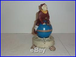 Original Clown On Globe Mechanical Bank Cast Iron Bank