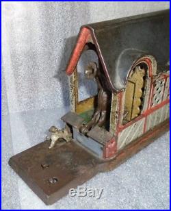 Original old mule entering barn cast iron mechanical bank