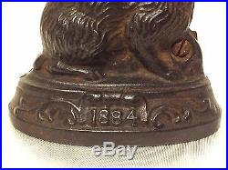 RABBIT ON BASE 1884 Cast Iron Still Bank