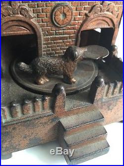 Rare Antique Cast Iron Mechanical Bank HL Judd Dog On Turntable & Building