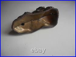 Rare antique Arcade painted cast Iron Seal on Rock Bank. Antique C. I. Bank
