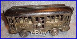 Rare old painted cast iron street car trolley toy still bank