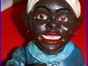 Reproduction Cast Iron Painted Mammy withScarf Mechanical Bank
