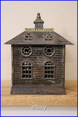STATE BANK cast iron building bank with solid door circa 1910 8+ inches tall