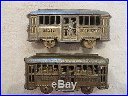 Set of Two A. C. Williams Cast Iron Main Street Trolley Still Banks