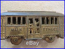Set of Two A. C. Williams Cast Iron Main Street Trolley Still Banks