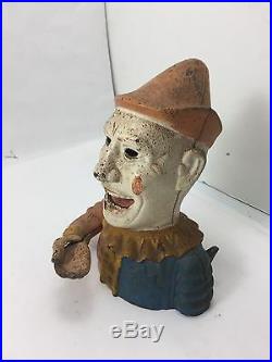 THE BOOK OF KNOWLEDGE Clown MECHANICAL COIN BANK Cast Iron Clown STORAGE WARS