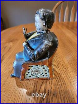 Tammany Antique Cast Iron Mechanical Bank. Manufactured June 8, 1875