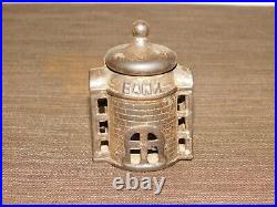 Vintage 3 1/4 High Cast Iron Pagoda Coin Bank