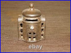 Vintage 3 1/4 High Cast Iron Pagoda Coin Bank