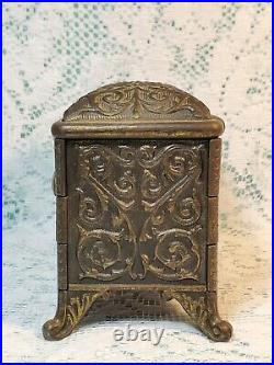 Vintage Cast Iron Jewel Chest Coffin Bank ornate with combination lock 1889