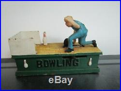 Vintage Cast Iron Mechanical Bank, Bowling Man original
