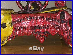 Vintage Cast Iron Mechanical Bank Professor Pug Frog's Bicycle Circus Feat