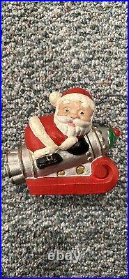 Vintage Cast Iron Santa Riding Rocket Coin Bank