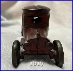 Vintage Cast Iron Still Bank Car With People And Rolling Wheels