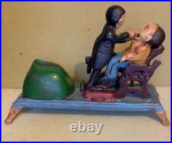 Vintage Cast Iron Toy Mechanical Bank. Dentist Pulling A Tooth