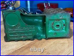 Vintage Earlier Artillery Book of Knowledge Cast Iron Mechanical Coin Bank