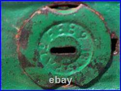 Vintage Earlier Artillery Book of Knowledge Cast Iron Mechanical Coin Bank