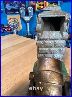 Vintage Earlier Artillery Book of Knowledge Cast Iron Mechanical Coin Bank