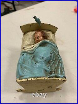 Vintage RARE Cast Iron Metal Baby In Bed with Bluebird Still Piggy Bank 4 x 3