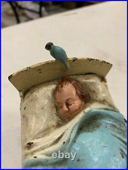 Vintage RARE Cast Iron Metal Baby In Bed with Bluebird Still Piggy Bank 4 x 3