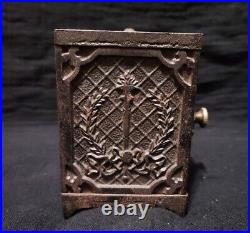 Vintage cast iron coin bank