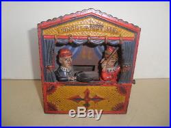Wonderful old original cast iron Punch and Judy Mechanical penny bank Pat. 1884