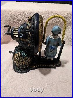 Works! Cast Iron Mechanical Bank Girl Skipping Rope